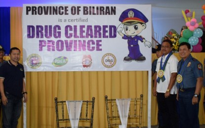 <p>DRUG-CLEARED. Officials pose after the declaration of Biliran as drug-free province on Friday (May 11,2018). Among the key officials present are Governor Gerardo Espina, Jr. (3rd from left), PDEA Regional Director Edgar Jubay (3rd from right) and PNP Regional Director Chief Supt. Gilberto Cruz (2nd from right).<em> (Photo by Sarwell Meniano) </em></p>